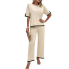 Vacation casual knitwear for women in cream with black trim short sleeve top and wide leg pants