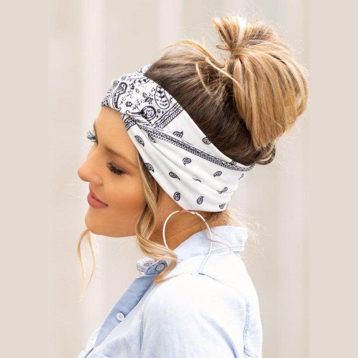 Stylish women's vacation hair accessories featuring a white and black patterned headband