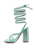 Stylish mint green vacation heels for women with unique spiral ankle strap and block heel design