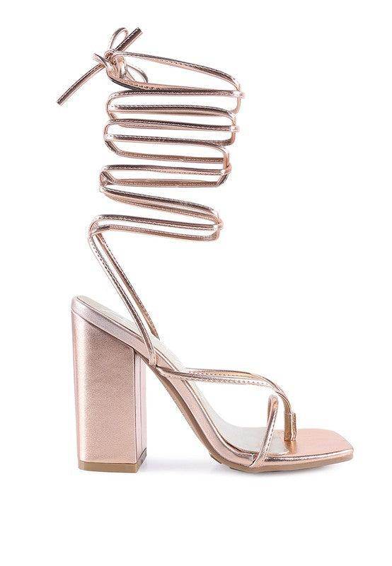 Stylish rose gold vacation heels for women with elegant ankle straps and block heels