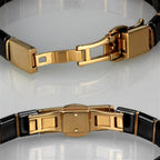 Elegant gold clasp bracelet in black, perfect vacation jewelry for women to complement any outfit