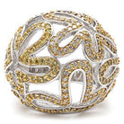 Elegant silver and gold ring with intricate design, perfect vacation jewelry for women