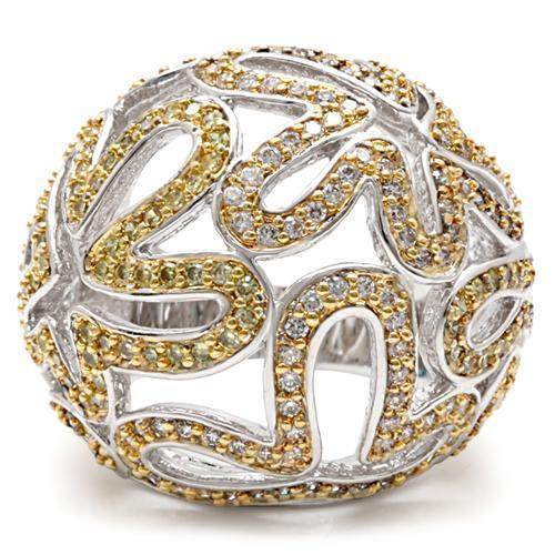 Elegant silver and gold ring with intricate design, perfect vacation jewelry for women