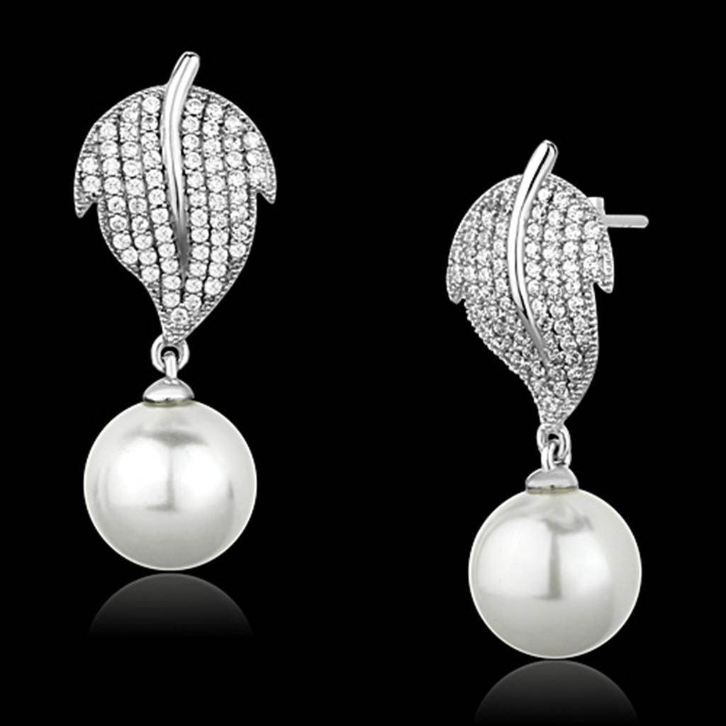 Elegant women's jewelry earrings featuring pearls and leaf design, perfect vacation jewelry for women