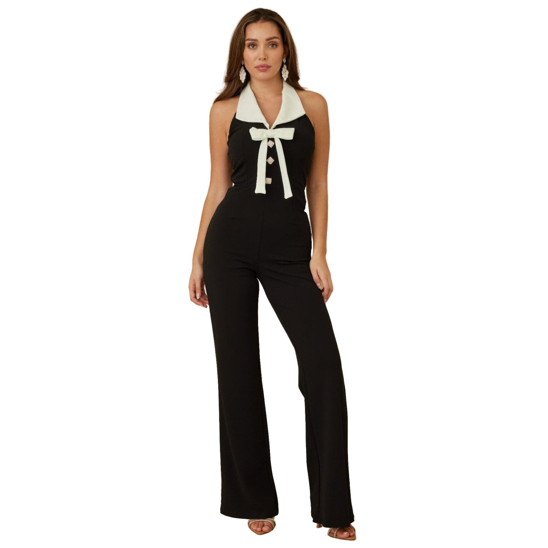 Elegant black vacation jumpsuit outfit for women featuring a halter neck and wide-leg design