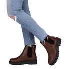 Fortune Dynamic women's vacation leather boots in brown with a stylish design and durable sole