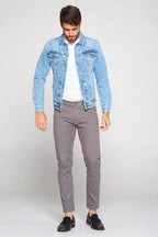 Men's Blue Age vacation light blue jacket styled with grey pants and a white shirt