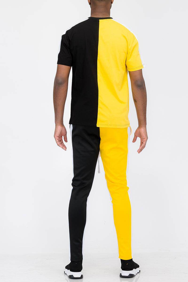 Back view of a men's activewear vacation mens clothing set in black and yellow colorblock design