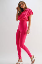 Stylish pink vacation outfit jumpsuit for women with a relaxed fit and trendy design
