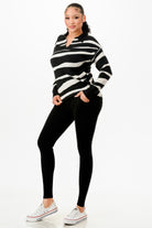 Stylish women's black and white striped outfit set, perfect for vacation outfits for women