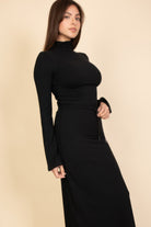 Chic black long-sleeve dress from VacationGrabs, ideal vacation outfits for women