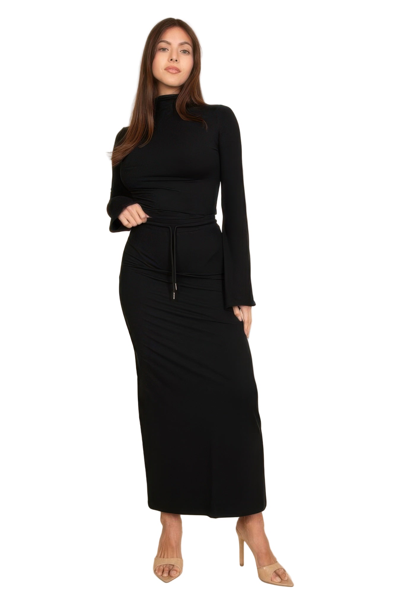 Vacation outfits for women featuring a sleek black long-sleeve dress with a fitted silhouette