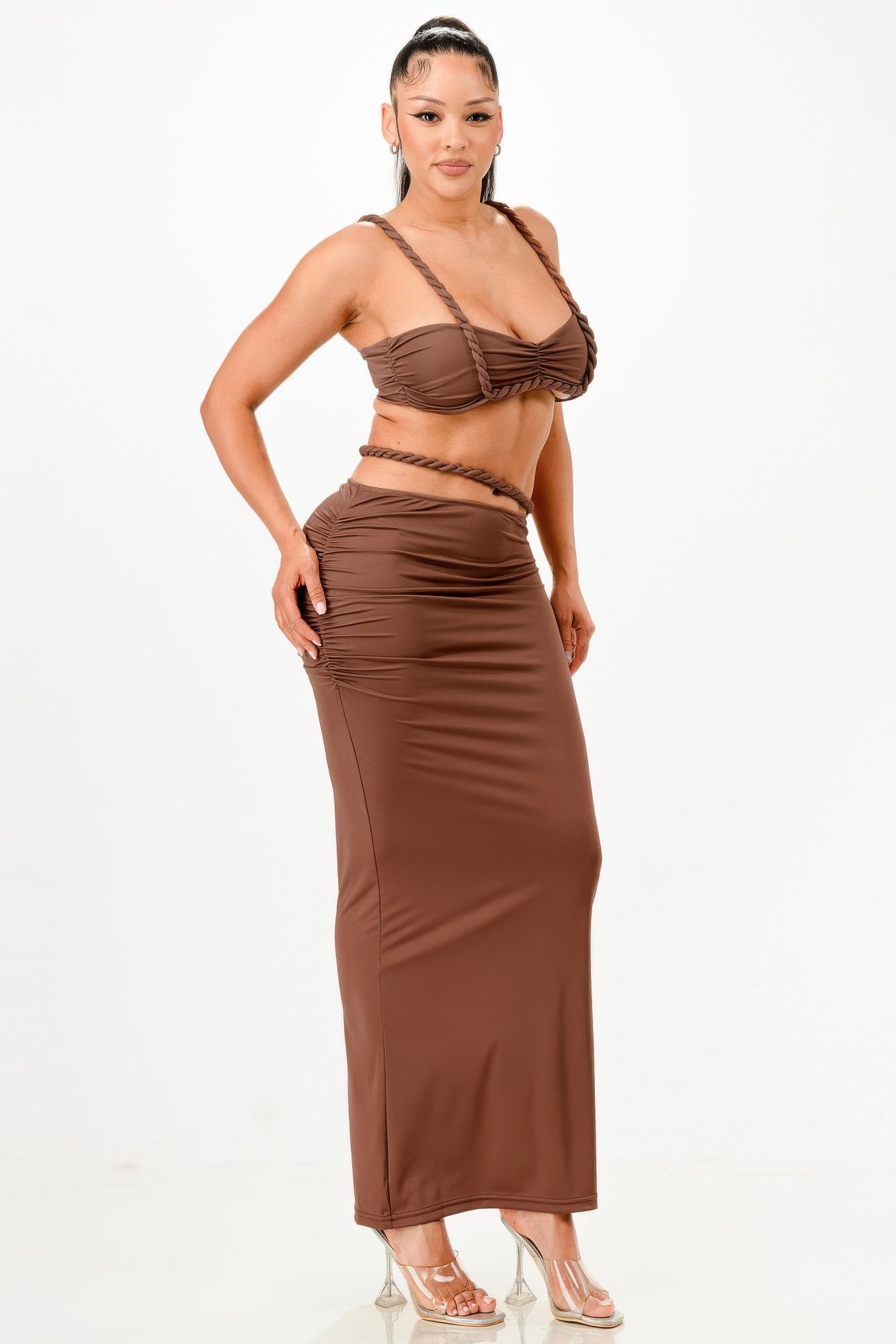 Stylish brown two-piece set featuring a cropped top and maxi skirt, perfect vacation outfits for women.