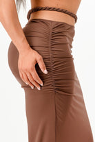 Brown fitted skirt with ruched detailing, perfect for stylish vacation outfits for women