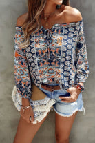 Vacation print long sleeve blouse in navy with floral design, perfect for casual summer outings