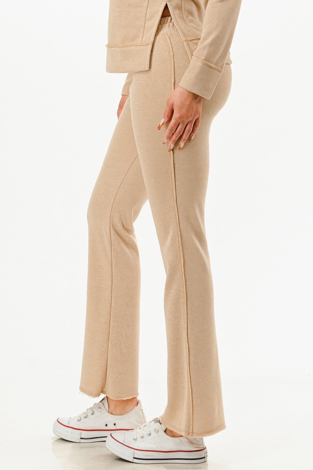 Vacation ready matching sweatsuit beige flared pants with comfortable fit for women