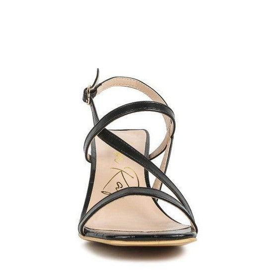 Chic black strappy heels for women, perfect for pairing with dresses and vacation ready sandals white