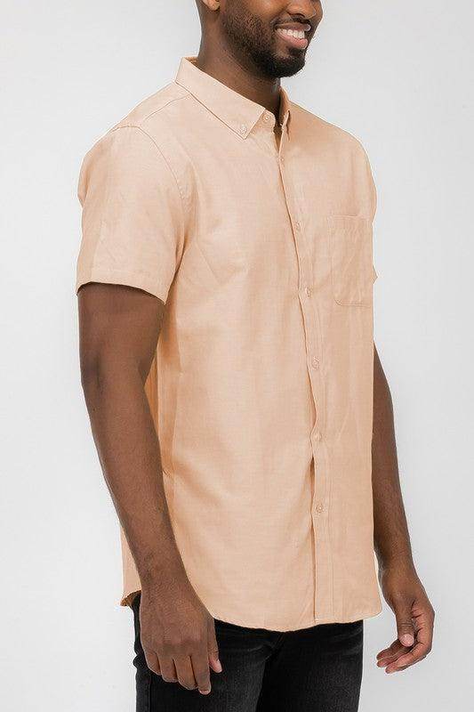 WEIV men's short sleeve vacation shirts in a light peach color, perfect for summer outings