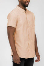 WEIV men's short sleeve vacation shirts in a light peach color, perfect for summer outings