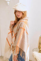 Bella Chic Women's Shawl Poncho in Neutral and Orange Hues as a vacation style accessory