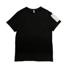 Vacation style black tee for men featuring a simple design with a unique shoulder accent