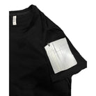 Vacation style black tee for men featuring a unique pocket design on the sleeve