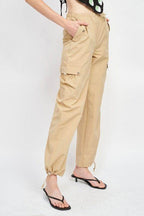 Emory Park women's vacation style cargo pants in beige with elastic waist and adjustable cuffs