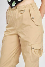 Emory Park Women's vacation style cargo pants in beige with cargo pockets and adjustable waistband
