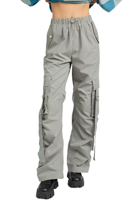 Emory Park women's vacation style cargo pants in light gray with utility pockets and adjustable straps