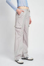 Emory Park women's vacation style cargo pants in light gray with utility pockets and a relaxed fit