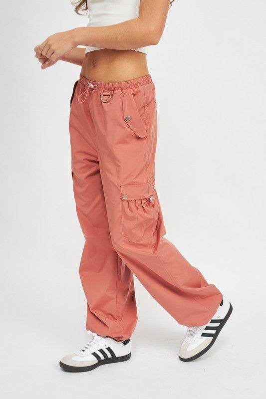 Emory Park women's vacation style cargo pants in coral with side pockets and a comfortable fit