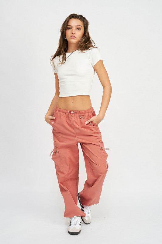 Emory Park women's vacation style cargo pants in pink with side pockets and a relaxed fit