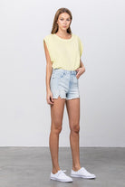 Insane Gene vacation style denim shorts in light wash with a trendy distressed hem