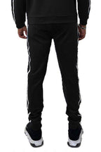 Black WEIV men's pants with side stripes, perfect for vacation style joggers