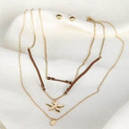 Bella Chic vacation style necklace layered with gold chains and a charm for trendy summer looks