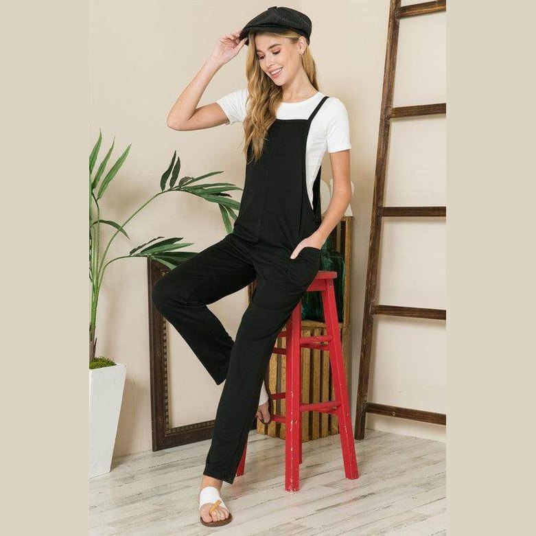 Stylish women's jumpsuit from Orange Farm Clothing in black, perfect for vacation style overalls.