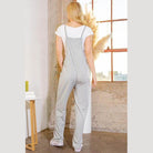 Back view of women's vacation style overalls in gray, perfect for casual outings and travel