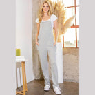 Stylish women's gray vacation style overalls with pockets and a comfortable fit