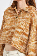 Emory Park vacation style sweater in warm tones with button details and a cropped fit