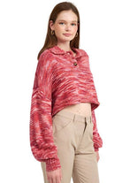 Emory Park women's vacation style sweater in pink with oversized sleeves and a button detail