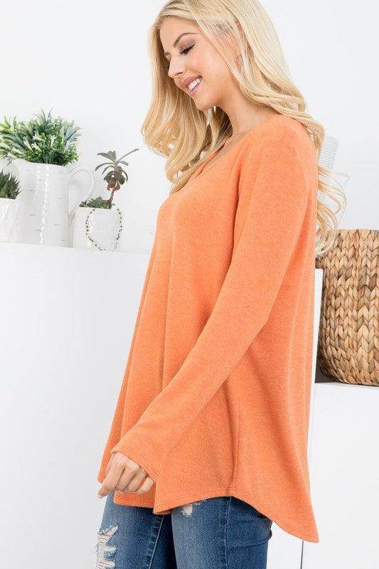 P & ROSE COLLECTION vacation style v-neck shirt in orange with long sleeves and relaxed fit