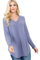 Women's vacation style v-neck shirt in lavender with a relaxed fit and long sleeves