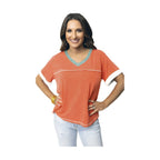 YNIQUE vacation style womens t-shirt in orange with contrasting green neckline and white sleeve cuffs