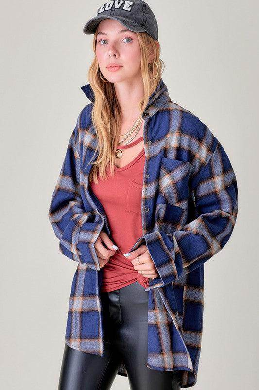La Miel Women's Flannel Shirt in Blue Plaid, a vacation wardrobe essential for stylish layering