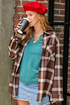 La Miel Women's Flannel Shirt in Brown Plaid, a vacation wardrobe essential for stylish outings