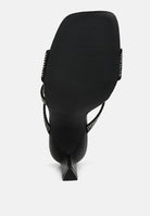 Black London Rag International Women's Heels with a stylish design perfect for vacation worthy shoes and apparel