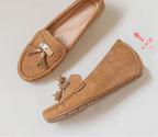 Women's tan loafers from VacationGrabs, vacation worthy with tassel detail