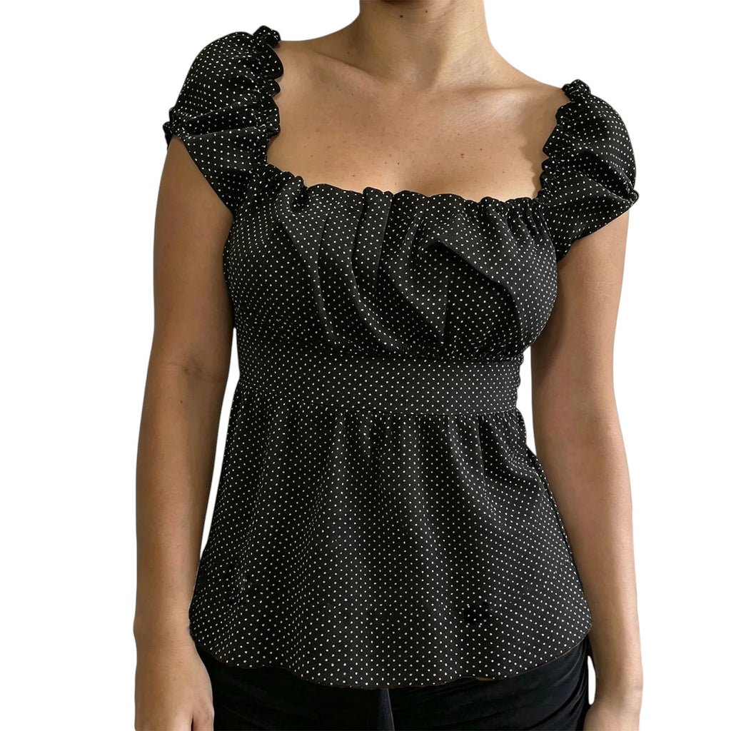 VacationGrabs black polka dot peplum top with square neckline and puff sleeves in a Y2K-inspired slim fit style