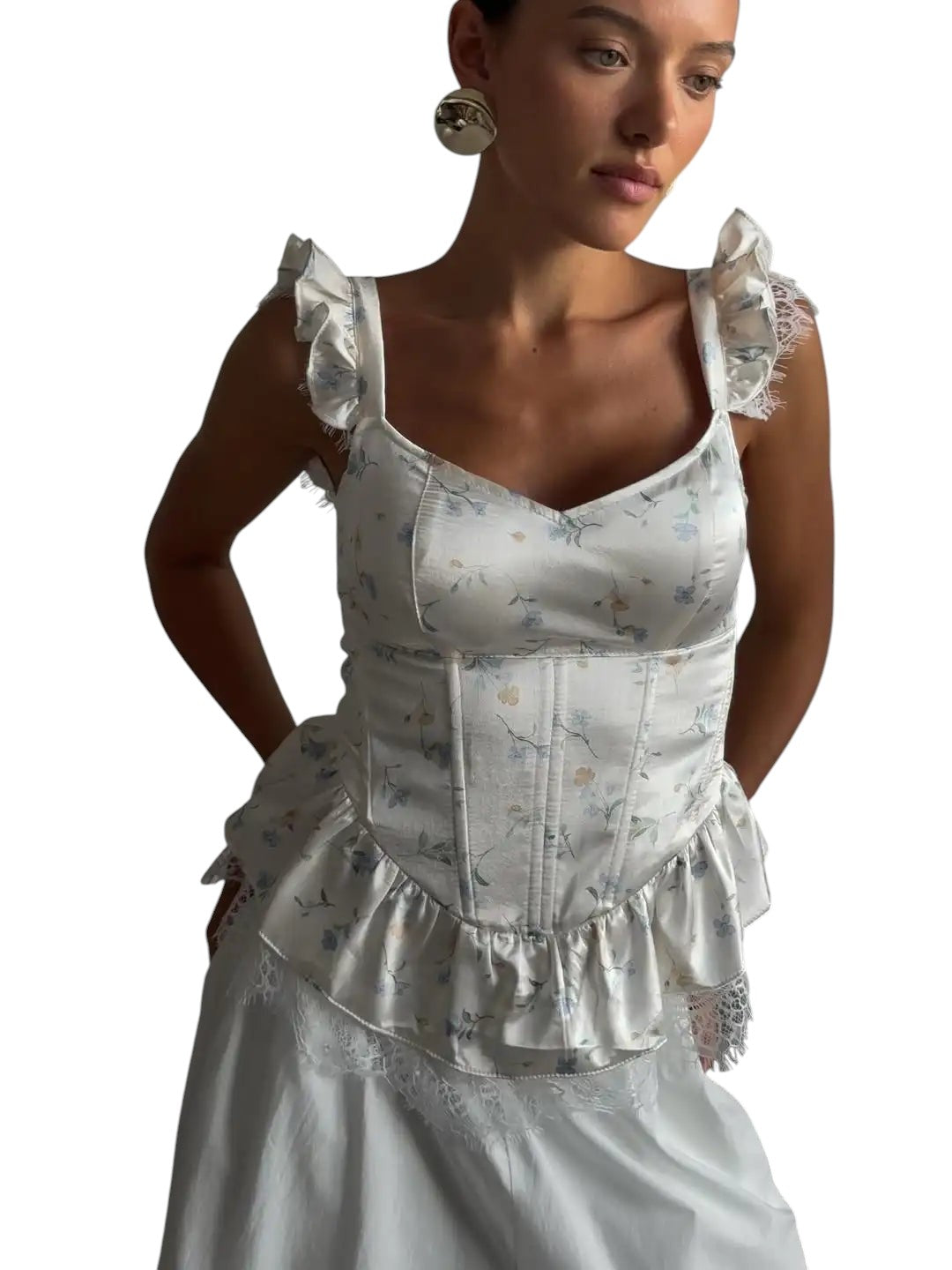 VacationGrabs white corset top with ditsy floral print, ruffle sleeves, and lace trim worn by a model