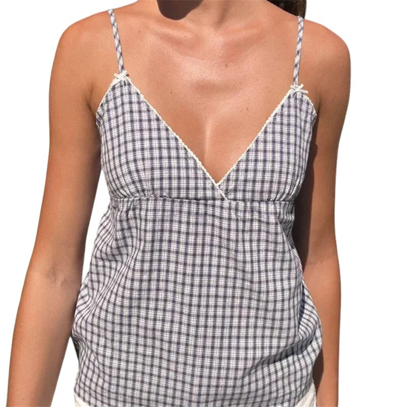 VacationGrabs black and white gingham peplum camisole with lace trim, spaghetti straps, and a V-neckline.